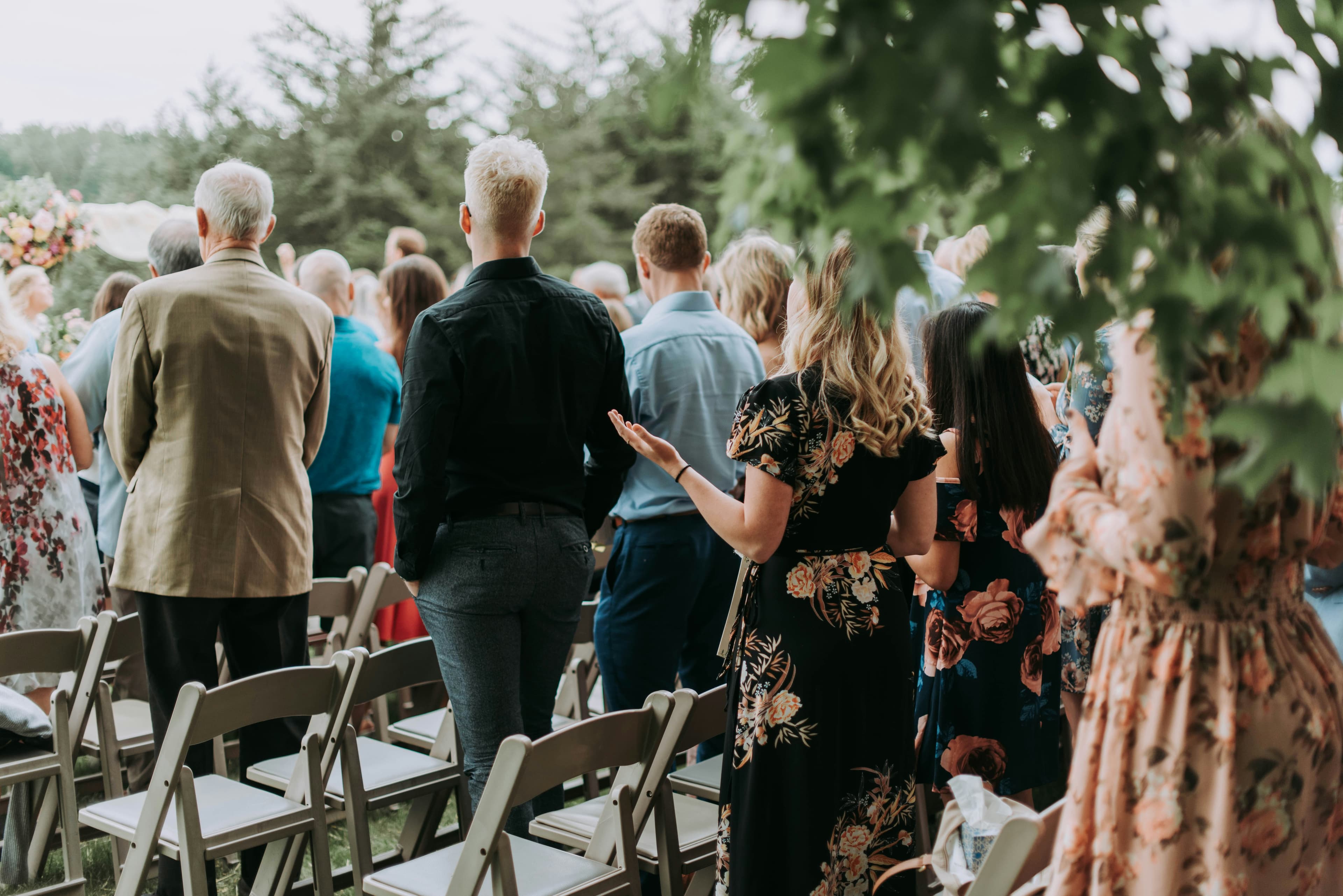 Group of wedding guests gathered together